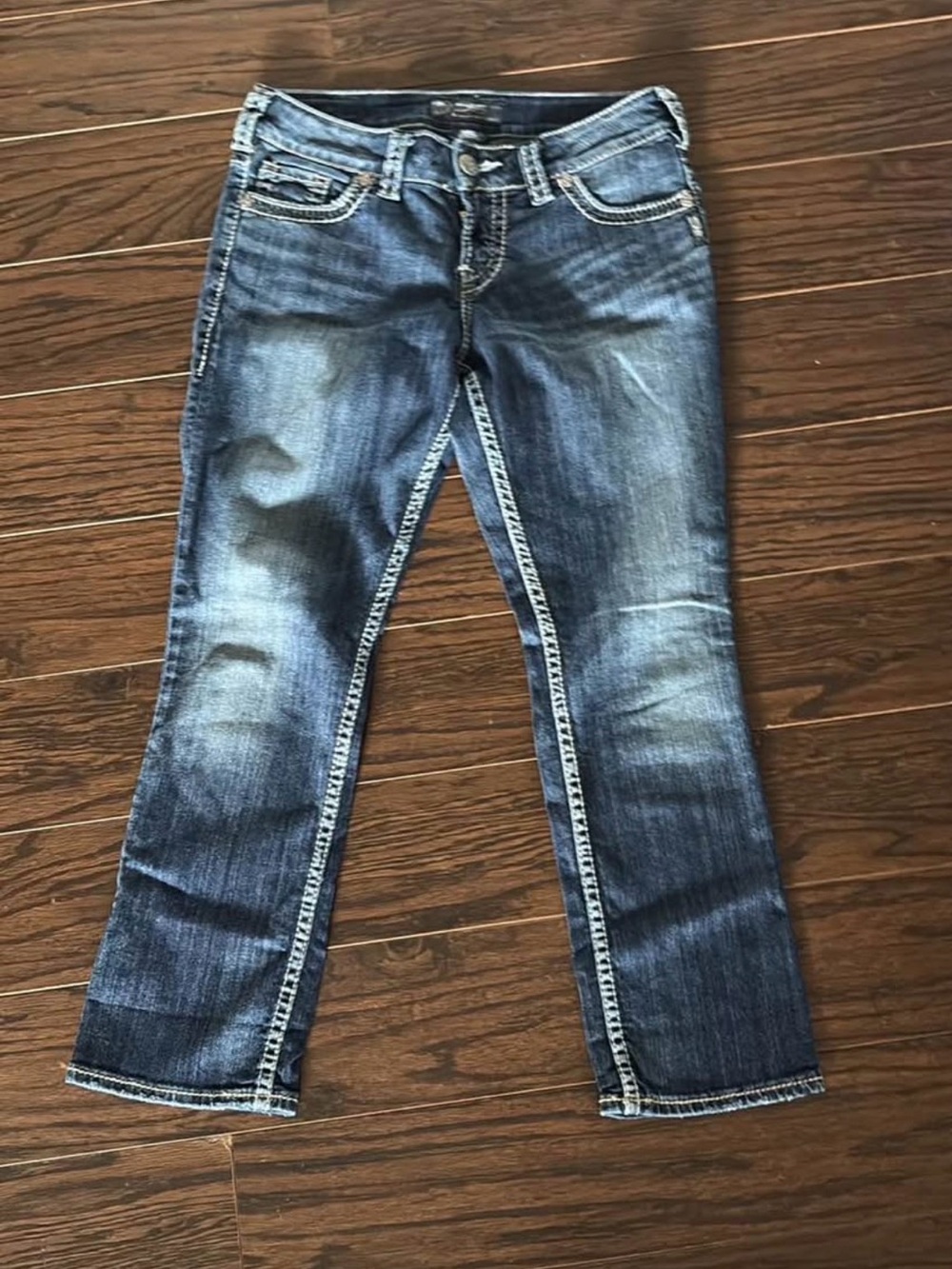 Woman’s silver jeans